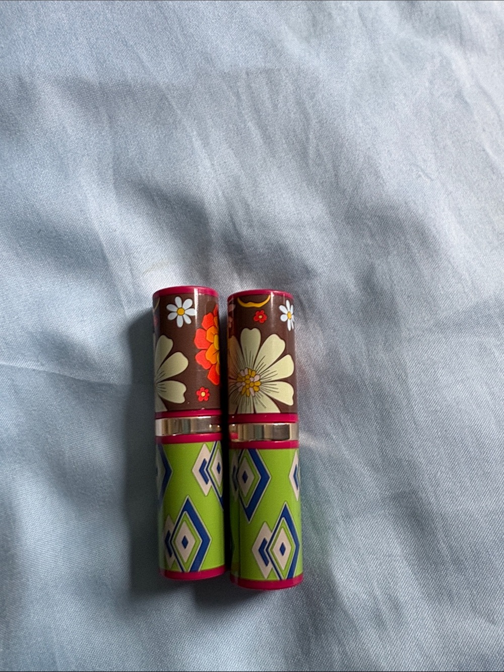 Estee Lauder Floral Lipstick-Style Decorative Tubes in Brown and Lime Green